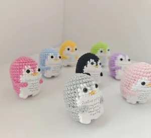 Handmade crochet positive energy penguins in various colors with motivational cards