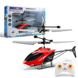 Red induction helicopter toy with remote control and retail packaging for children play
