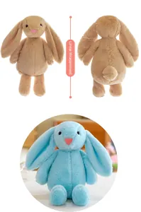 Detailed view of cute long-eared rabbit plush toys in soft beige and blue colors.