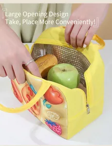 Detailed view of insulated fruit print lunch bag with wide opening and foil lining