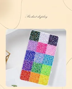 Close-up of 15-compartment storage box filled with vibrant DIY colorful resin rhinestones