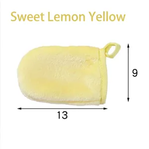 Soft yellow flannel makeup remover glove showing dimensions 13cm by 9cm for face cleaning.