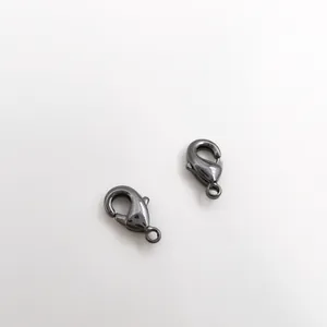 Macro view of high-quality gunmetal lobster clasps for DIY jewelry making and necklaces.