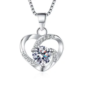 Elegant silver heart pendant necklace with a central round brilliant cubic zirconia