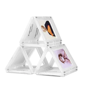 Detail of creative 3-inch magnetic transparent photo frames stacked in a pyramid.