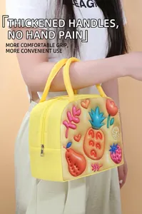 Close-up detail of yellow insulated lunch bag featuring colorful 3D fruit patterns