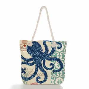 Close-up of vintage nautical octopus print beach tote bag with heavy rope handles