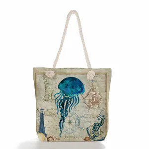 Large vintage nautical tote bag with blue jellyfish print and thick rope handles.