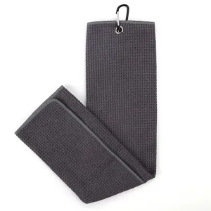Dark grey microfiber golf towel featuring waffle texture and black metal carabiner.
