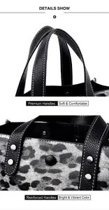 Detailed view of leopard print leather handbag showing soft handles and sturdy rivets