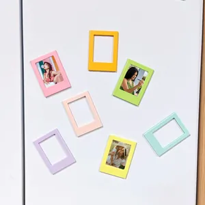 Vibrant set of seven 3-inch magnetic photo frames for Instax mini photos on a fridge.