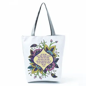 White floral tote bag with Buddha inspirational quote print and grey shoulder straps