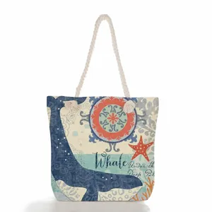 Vintage ocean whale print canvas beach bag with thick white rope handle and large capacity.