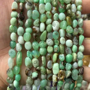 Close-up of natural irregular green stone chips for DIY jewelry making