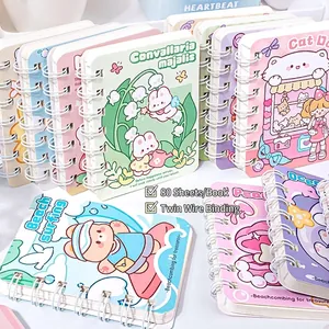 Kawaii A7 mini spiral notebooks featuring cute cartoon patterns, 80 sheets per book