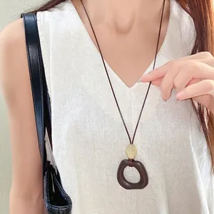Retro wax cord necklace with irregular brown oval pendant for women