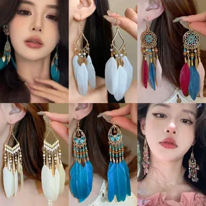 Vintage bohemian teardrop leaf feather earrings set in various colors for ethnic fashion