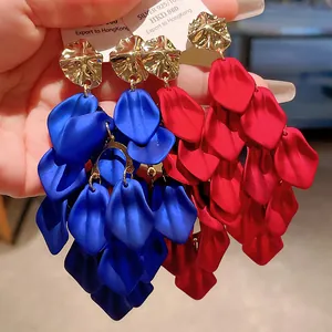 Exaggerated matte floral petal tassel earrings in red and blue with golden studs
