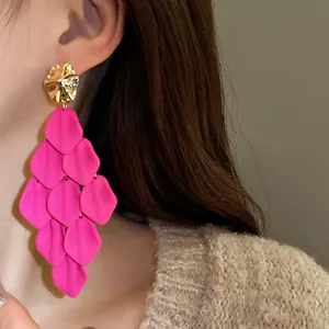 Statement hot pink cascading petal tassel earrings with gold hammered top