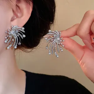 Elegant firework-shaped stud earrings with zirconia and pearls, luxury fashion jewelry