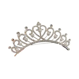 Elegant silver bridal tiara crown featuring white pearls and heart-shaped rhinestone details