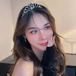 Elegant silver tiara with rhinestones worn by a bride for a princess look
