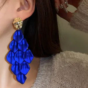 Exaggerated blue petal tassel earrings with silver needles for a stylish retro look
