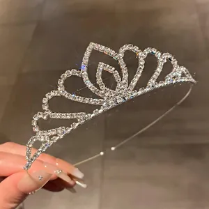 Detailed macro view of a sparkling crystal bridal tiara for weddings and birthday parties