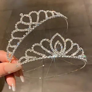 Detailed view of two sparkling rhinestone bridal tiaras for weddings and parties