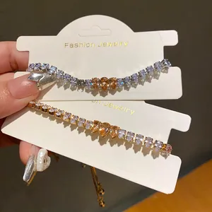 Close-up detail view of elegant zircon bracelets featuring waterdrop champagne stones
