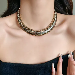 Statement U-shaped leopard print collar necklace in a bold gold metallic finish for women