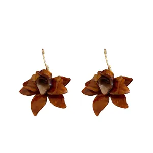 Elegant vintage brown flower resin earrings with marble texture on white background