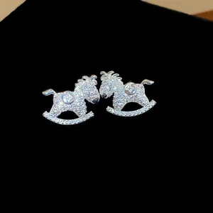 Sparkling silver needle rocking horse stud earrings encrusted with clear zircons for women