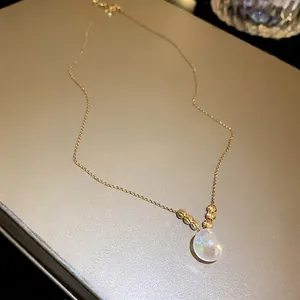 Elegant French style mermaid pearl necklace with a minimalist gold chain for women.