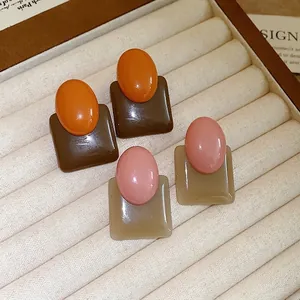 Retro French style geometric resin stud earrings with contrast color block and silver pins