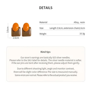 Detail view of retro resin stud earrings featuring orange oval and brown square geometry