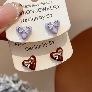 Gold-plated silver needle heart bow stud earrings in lavender and maroon finishes