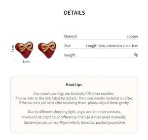 Detailed view of red heart bow earrings with dimensions and copper material specifications