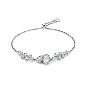 Elegant silver bracelet with cubic zirconia and blue moonstone-like gems