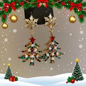 Pendientes festivos de árbol de Navidad bañados en oro con copos de nieve y strass de colores