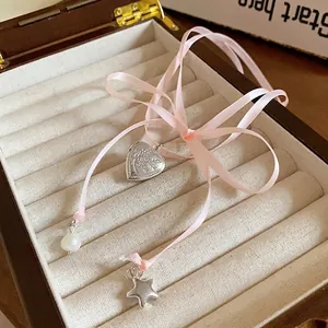 Sweet pink ribbon necklace with heart pendant, pearl and star charms for girls