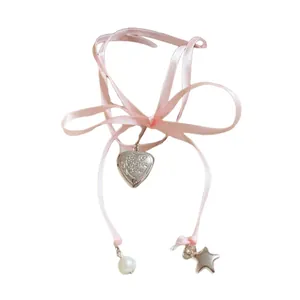 Sweet pink ribbon necklace with heart pendant pearl and star charms for women.