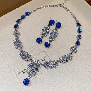 French vintage jewelry set with blue floral rhinestones necklace and earrings