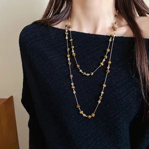 Elegant vintage tiger eye stone beaded double-layer necklace worn on black dress