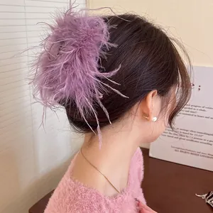 Close-up detail of an elegant purple feather hair claw clip for women hair styling