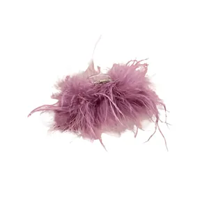 Elegant purple feather hair claw clip with a transparent base for fairy style hair styling.
