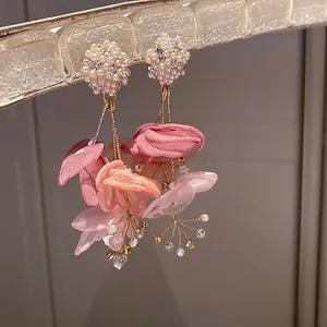 Elegant floral drop earrings featuring pearls and delicate pink mesh petals for women