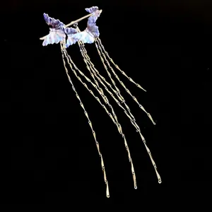 Elegant Korean style butterfly tassel ear cuff with long golden fringe chains