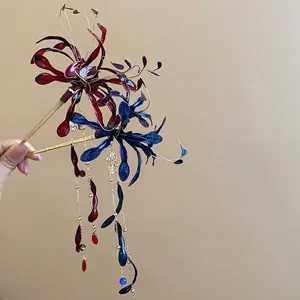 Elegantes horquillas de esmalte de lirio de araña roja y azul con borlas