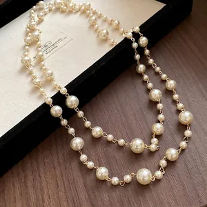Elegant French retro multi-layer long pearl necklace with gold chain links for women